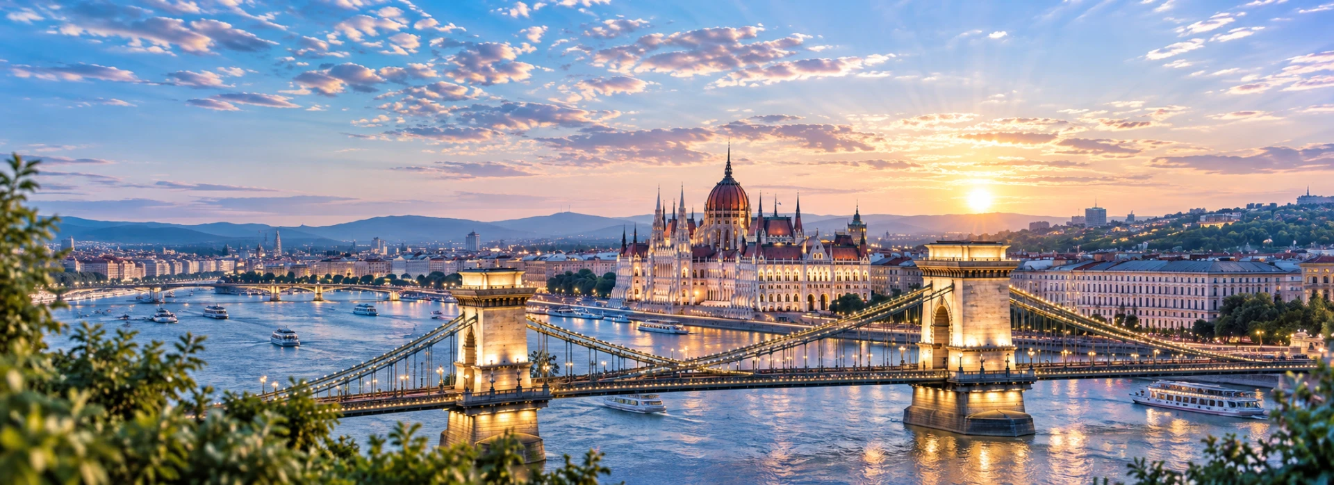 Bright panoramic view of Budapest with the Hungarian Parliament, Chain Bridge and Danube